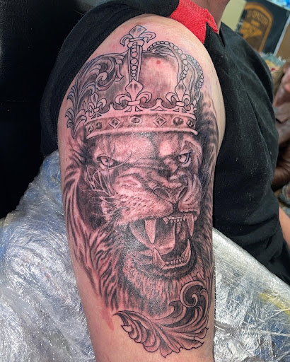 Explore cherry blossom tattoo ideas, creative tattoo ideas in Butte, available at Ink Therapy