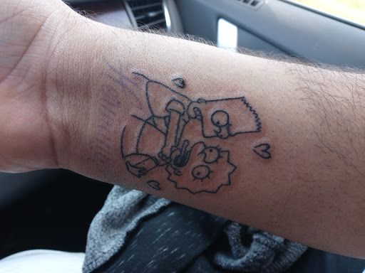 Explore neck tattoo ideas guys, creative tattoo ideas in Avon Park, available at Lions Den Ink Studio at The Collective