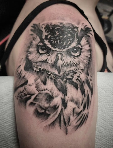 Find skull tattoo ideas for females for your next unique tattoo in Cedar Falls at The Iron Quill Tattoo Parlor