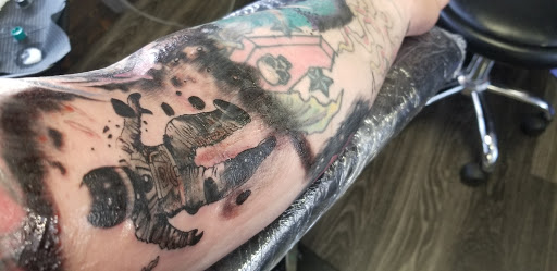 Explore working class tattoo ideas, creative tattoo ideas in Bridgeport, available at Breaking skin tattoo and body piercing