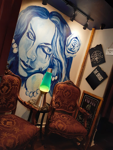 Explore tattoo ideas on belly, creative tattoo ideas in Bronx, available at Brass Knuckles Ink Tattoo Studio