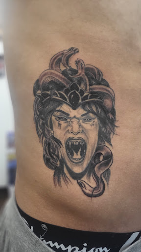 Explore full neck tattoo ideas, creative tattoo ideas in Lewiston, available at Walkins tattoos studio
