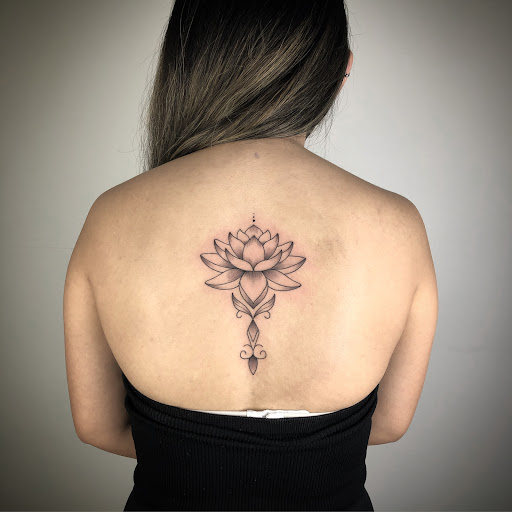 Explore hand and wrist tattoo ideas, creative tattoo ideas in Orange, available at Baron Art Tattoo