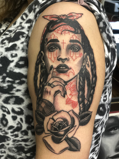 Explore mother and child tattoo ideas, creative tattoo ideas in Green Bay, available at Skinny Buddha Tattoo