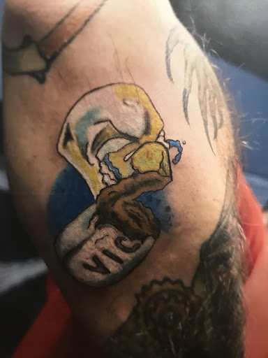 Explore colour tattoo sleeve ideas, creative tattoo ideas in San Angelo, available at Alchemy Tattoo and Piercing Studio