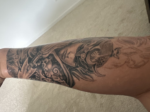 Find tattoos ideas for moms for your next unique tattoo in Norcross at Brotherhood Tattoo