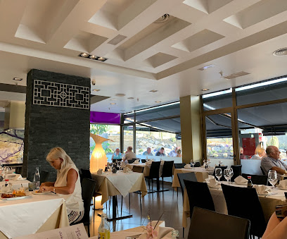 Restaurante Overseas - Calle Sta. Fe, 19, 38650 Arona, Santa Cruz de Tenerife, Spain