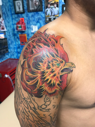 Explore simple silver lining tattoo ideas, creative tattoo ideas in Aurora, available at Ronin Tattoo Studio INC