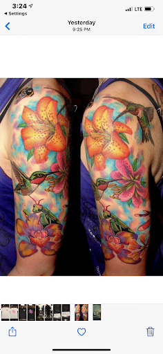 Explore tattoo ideas for upper arm, creative tattoo ideas in Orange, available at Smokin Irons Tattoo