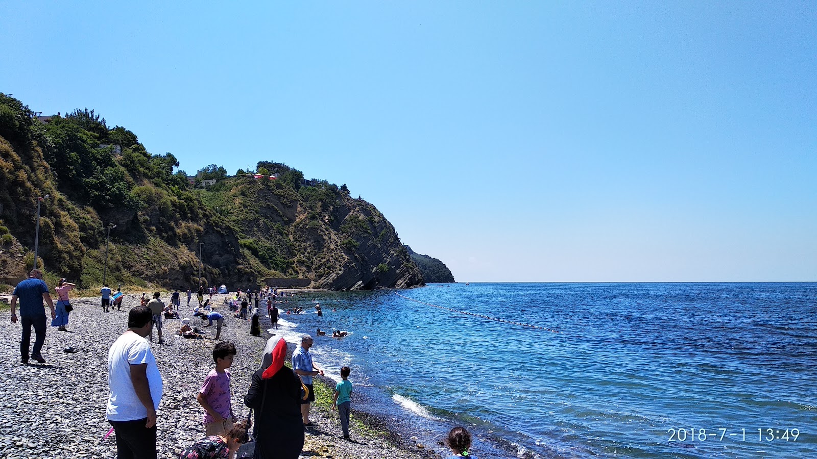 Foto von Trilye Sahil beach und die siedlung