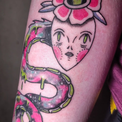 Find boyfriend name tattoo under breast ideas for your next unique tattoo in Carbondale at Bonedale Tattoo