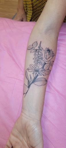 Explore flower ankle tattoo ideas, creative tattoo ideas in Carbondale, available at Bonedale Tattoo