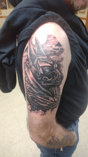 Explore cover up tattoo ideas for women, creative tattoo ideas in Sheridan, available at Cutthroat Art and Tattoo Studio