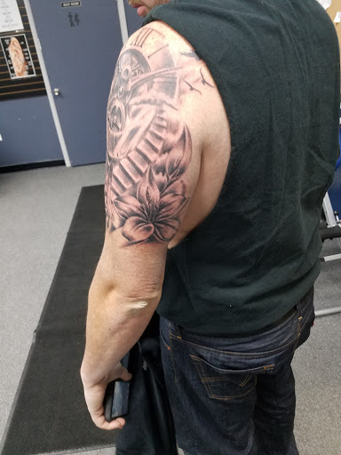 Tattoo Shop «Next Level Tattoo Company - Imlay City», reviews and photos, 420 E 3rd St, Imlay City, MI 48444, USA