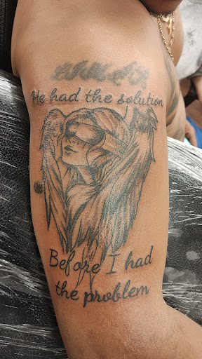 Explore black people tattoo ideas, creative tattoo ideas in Lewiston, available at Walkins tattoos studio