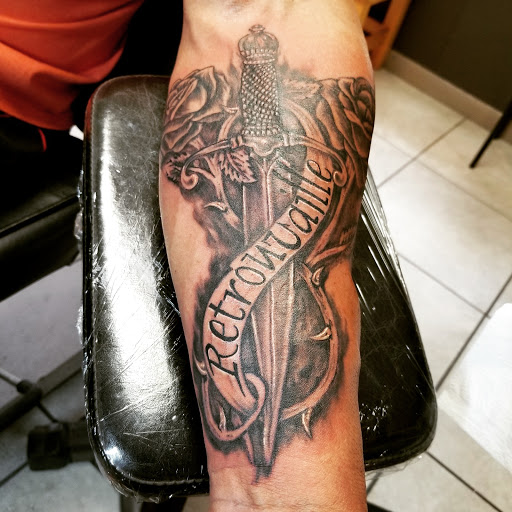 Explore grinch tattoo ideas, creative tattoo ideas in Lake Wales, available at Body Armor Tattoo & Piercings