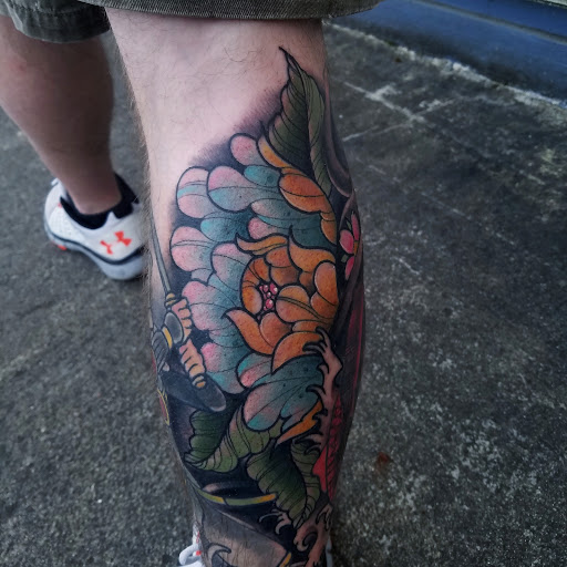 Explore rainbow tattoo ideas, creative tattoo ideas in Snohomish, available at Unknown Tattoo Co.