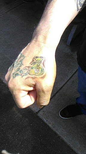 Explore gold tattoo ideas, creative tattoo ideas in Owosso, available at Expressions Body Art Studio