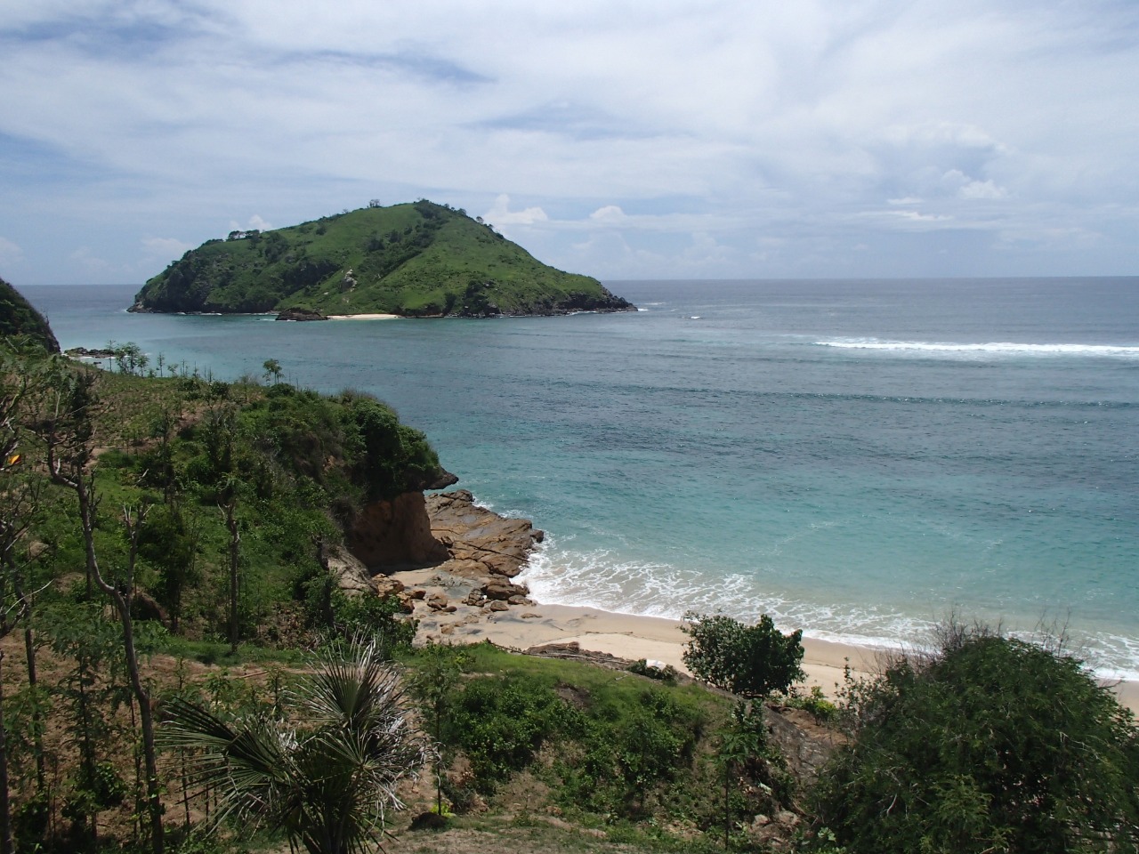 Fotografija Tebuak Beach z ravna obala