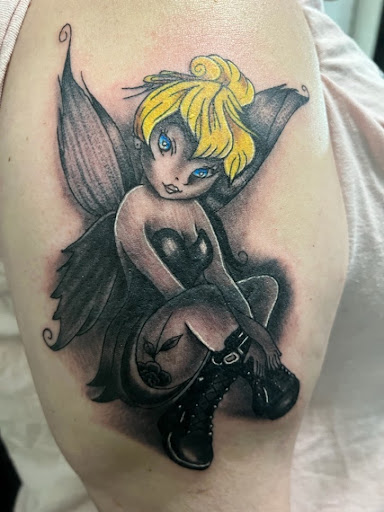 Explore tattoos for your son ideas, creative tattoo ideas in Angier, available at Tattoo Serenity