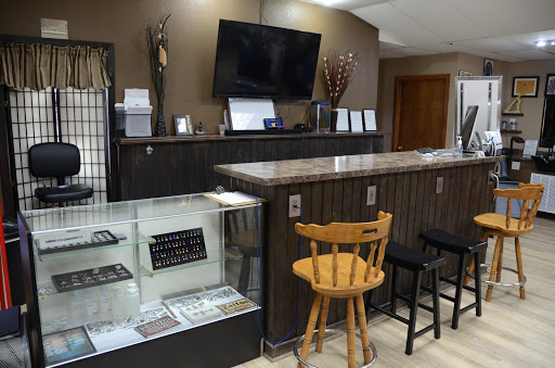 Explore womens thigh tattoo ideas, creative tattoo ideas in Ottumwa, available at Family Tradition TattoosPiercings