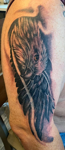 Explore mens wedding band tattoo ideas, creative tattoo ideas in Mayodan, available at Bleeding Ink Tattoo