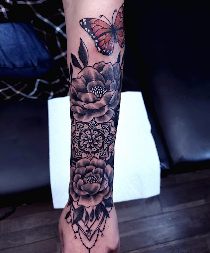 Explore red tattoo ideas women, creative tattoo ideas in Wabash, available at Steel Rose Tattoo Studio