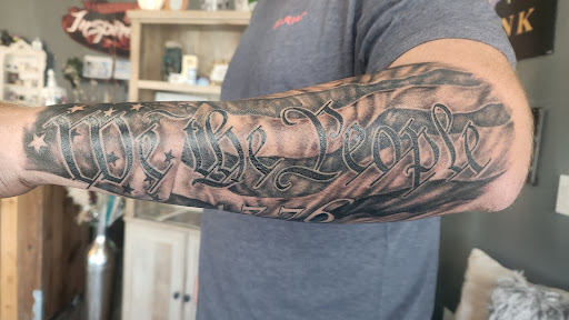 Explore hand tattoo ideas for females, creative tattoo ideas in Coquille, available at Inspired Ink Tattoo Shop