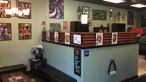Explore dolphin tattoo ideas for females, creative tattoo ideas in Fontana, available at Dark Hearts Tattoo Gallery
