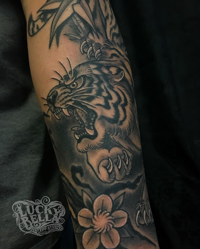 Explore batman logo tattoo ideas, creative tattoo ideas in Maumelle, available at Lucky Bella Tattoos