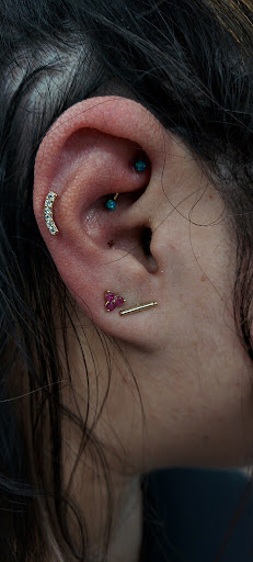 Explore biking tattoo ideas, creative tattoo ideas in Buford, available at Wild Tribe Tattoos and Piercings