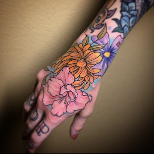 Explore sun tattoo ideas for men, creative tattoo ideas in Titusville, available at Exclusive Ink Studio