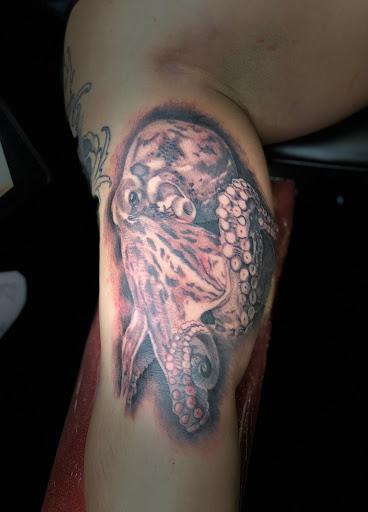 Explore hellscape sleeve tattoo ideas, creative tattoo ideas in Jessup, available at Savage Ink Tattoo Studio