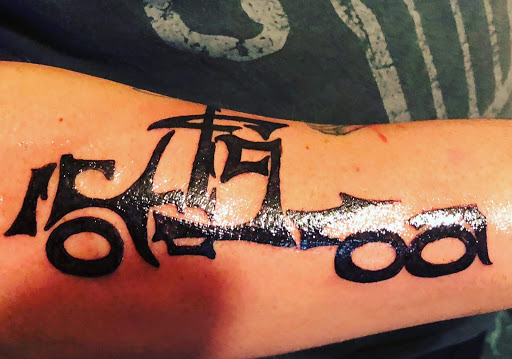 Explore marathon tattoo ideas, creative tattoo ideas in Paris, available at Twizted Dezignz