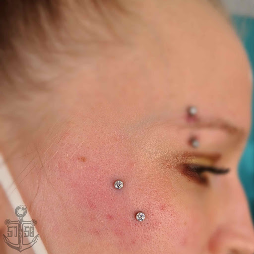 Explore stick poke tattoo ideas, creative tattoo ideas in Kearney, available at Studio 5150 Piercing & Fine Jewelry