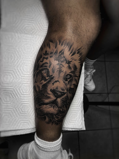 Explore awesome sleeve tattoo ideas for guys, creative tattoo ideas in Lavonia, available at 1890 Tattoo Co.