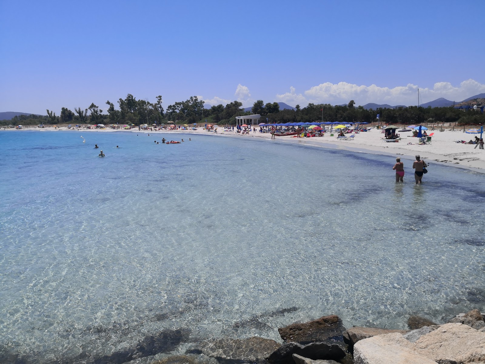 Foto von Porto Ottiolu mit feiner beiger sand Oberfläche