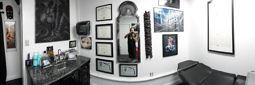 Explore red hand tattoo ideas, creative tattoo ideas in Sarasota, available at Z-Edge Tattoo and Body Piercing North Shop