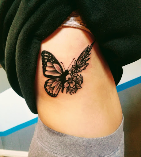 Explore mens sleeve tattoo filler ideas, creative tattoo ideas in Covington, available at River Ratz Tattoo
