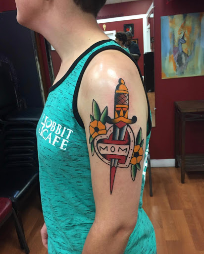 Explore sign language tattoo ideas, creative tattoo ideas in Katy, available at Artistic Impressions Tattoo Studio