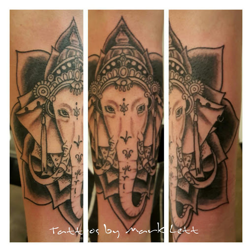 Explore ideas for arm tattoos, creative tattoo ideas in Saint Petersburg, available at Edens Apple Tattoos and Piercings