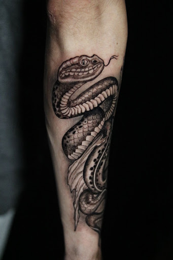 Explore penguin tattoo ideas, creative tattoo ideas in New Braunfels, available at Art of War 2 Tattoo Studios