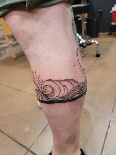 Explore male stomach tattoo ideas, creative tattoo ideas in Venice, available at KISS KISS TATTOO & PIERCING