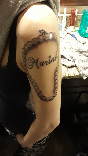 Explore nursing tattoos ideas, creative tattoo ideas in Arlington, available at The Chosen One Ink