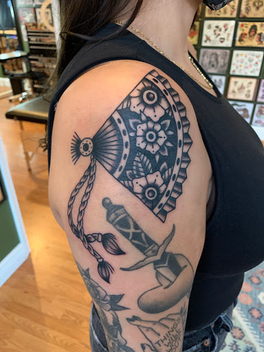 Explore occult tattoo ideas, creative tattoo ideas in Grandville, available at Lighthouse Tattoo Company