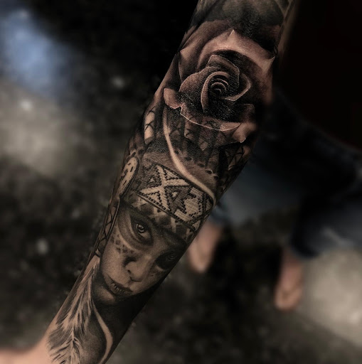 Explore american traditional elbow tattoo ideas, creative tattoo ideas in Redding, available at Blessed Ink