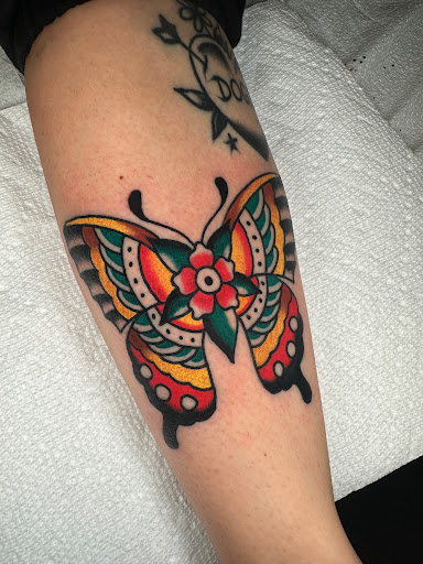 Explore may birth flower tattoo ideas, creative tattoo ideas in Johnson City, available at Gold Cross Tattoo Co.