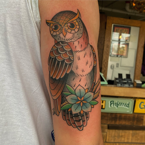 Explore joker hand tattoo ideas, creative tattoo ideas in Superior, available at Northlandia tattoo parlor