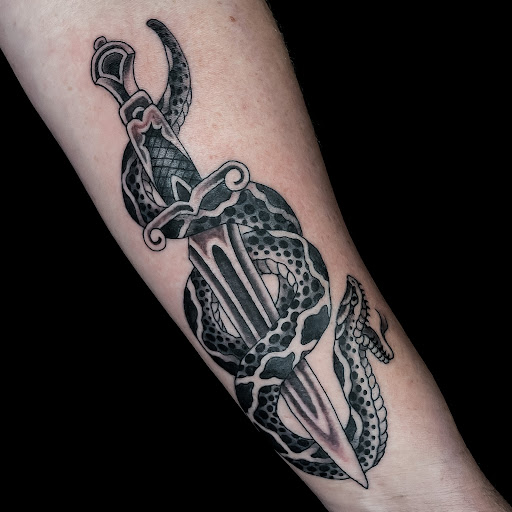 Explore upper arm cover up tattoo ideas, creative tattoo ideas in Greenville, available at Great Wolf Tattoo