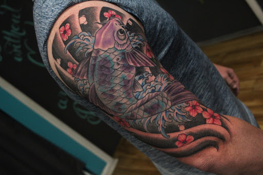 Explore banksy tattoo ideas, creative tattoo ideas in Homosassa, available at Citrus Tattoos